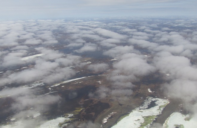 Tundra beneath clouds near Arviat. Photo: Debbie Buehler
